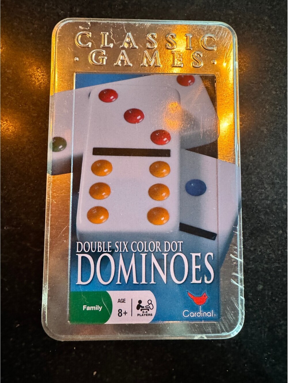 New, factory-sealed Cardinal Double Six Color Dot Dominoes in a collectible tin